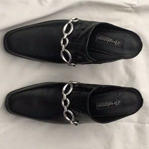 Brighton leather clogs.